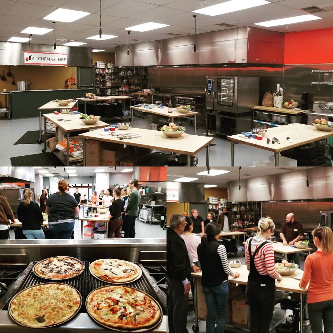 a group of people preparing food in a kitchen