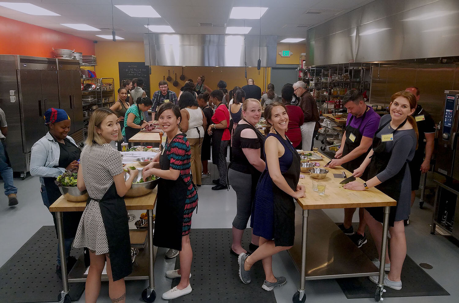 a group of people standing in a room