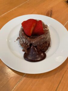 a piece of chocolate cake on a plate