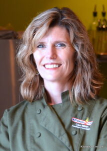 a woman smiling for the camera